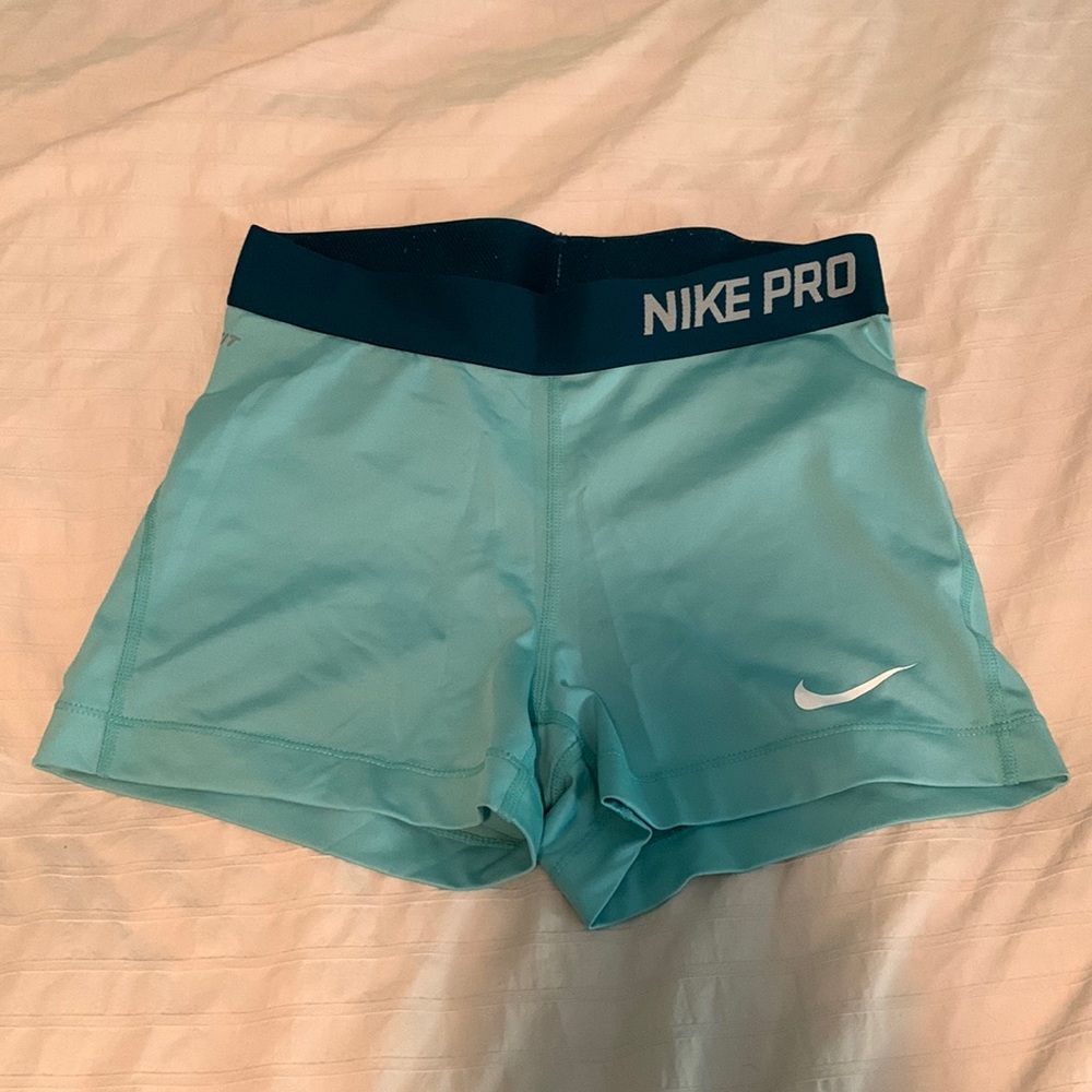 Nike Pro Light Teal Athletic Shorts with Navy Waistband